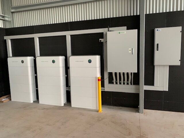 Three Sigenergy battery cabinets and switchboards in a Heyfield shed